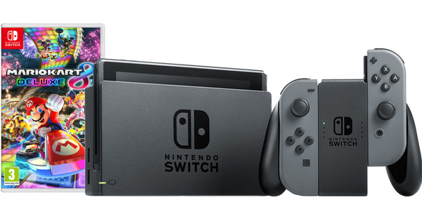 nintendo switch in gray with mario kart game and accessories