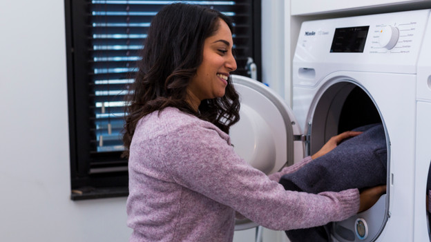 Customer does their laundry