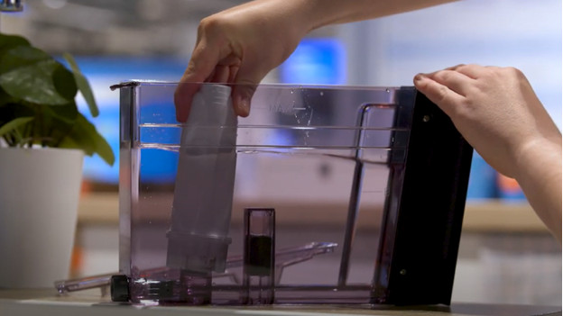 Place the water filter in the water tank