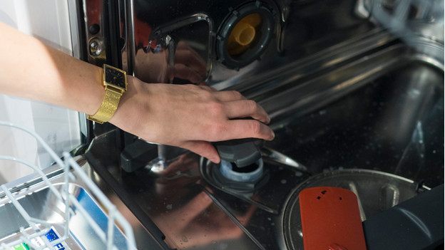 dishwasher, salt compartment, open, for softening water Stock Photo