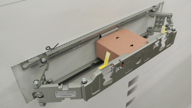 Cardboard box in the wall mount