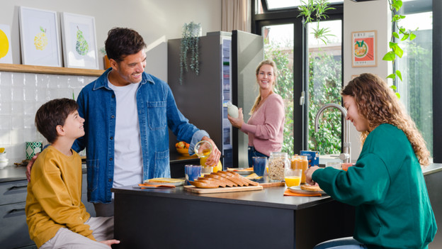 Family having lunch inside