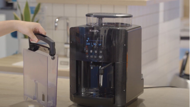 How do you clean the brew group of your Krups coffee machine? - Coolblue -  anything for a smile