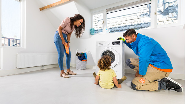 How do you lift your washing machine to the right place