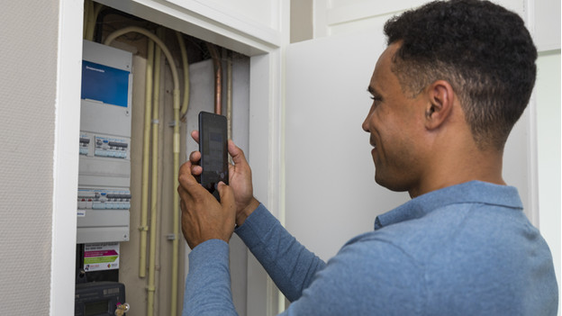 Customer takes photo of fuse box