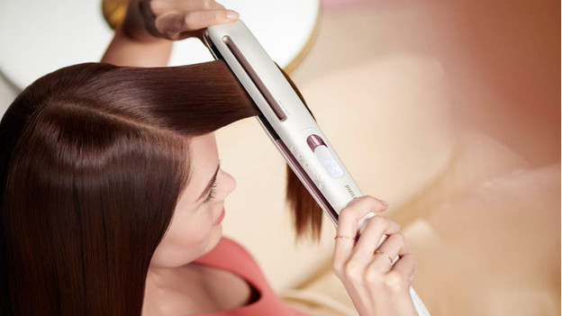 Hair straightener with ionic technology