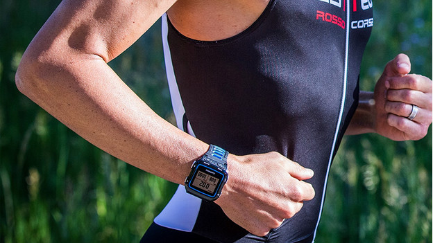 Triathlete with sports watch