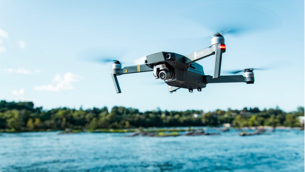 Drone above the water. Be cautious, water damage isn't covered by the warranty.