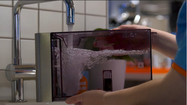 Vul het waterreservoir