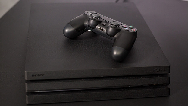 PlayStation 4 console with controller.