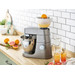 Kenwood AT312 Citrus Press product in use