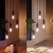 Philips Hue Filament White Ambiance Standard 4-pack + Bridge product in use