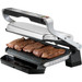 Tefal OptiGrill XL GC724D + Snacking & Baking accessoire product in gebruik