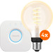 Philips Hue Filament White Ambiance Globe 4-pack + Bridge Main Image