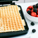 GreenPan Elite Waffle Iron Blue Haze product in use