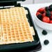 GreenPan Elite Waffle Iron Black product in use