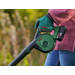 Bosch Universal LeafBlower 18V-130 + Starter Set 1x 18V Battery (2.5Ah) product in use