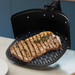 Philips Airfryer Pizza- en Grillplaat HD9963/00 product in gebruik