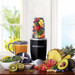 Nutribullet 600 Black 8-piece product in use
