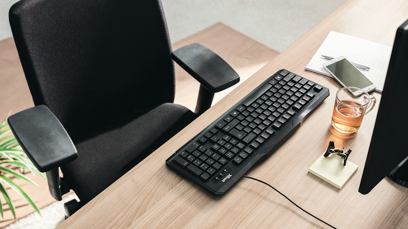 Desk chair behind a desk.