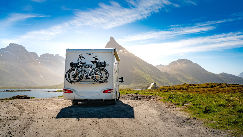 Camper with bikes in the mountains