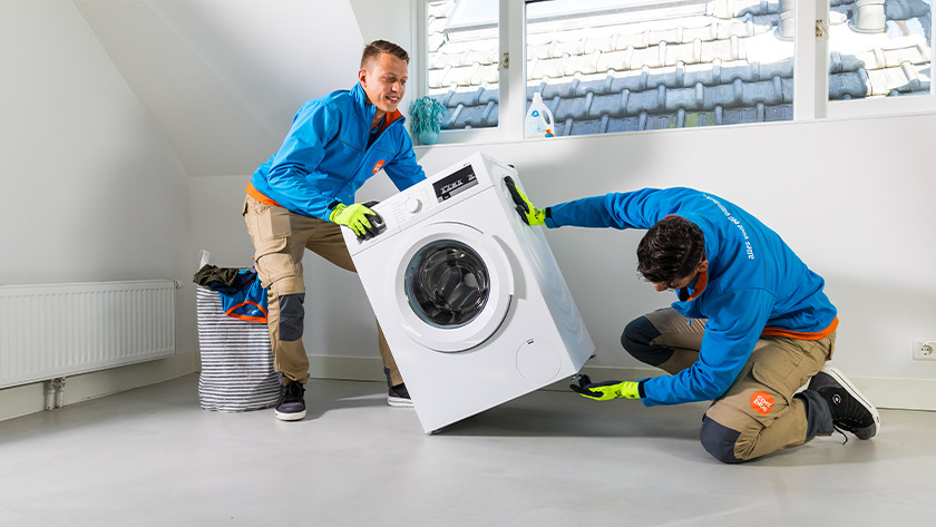 how to move a washing machine down stairs