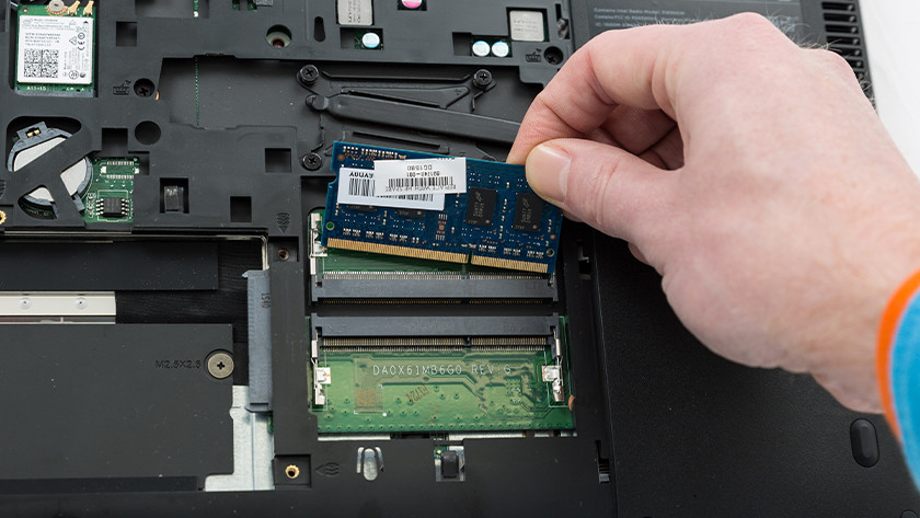 Expert installs RAM in a Windows laptop