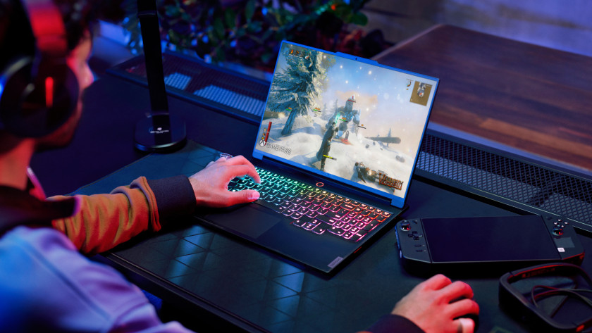 Someone gaming on a Lenovo laptop.