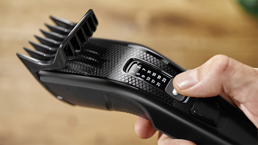 Slider adjustable shaving length comb attachment 