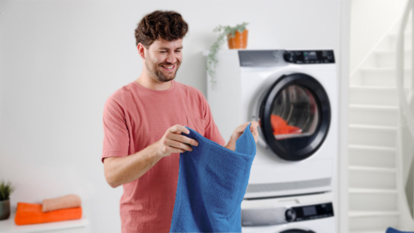 Person folds laundry