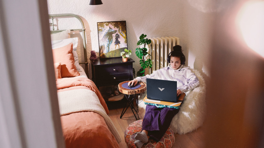 Person gaming on an HP Victus