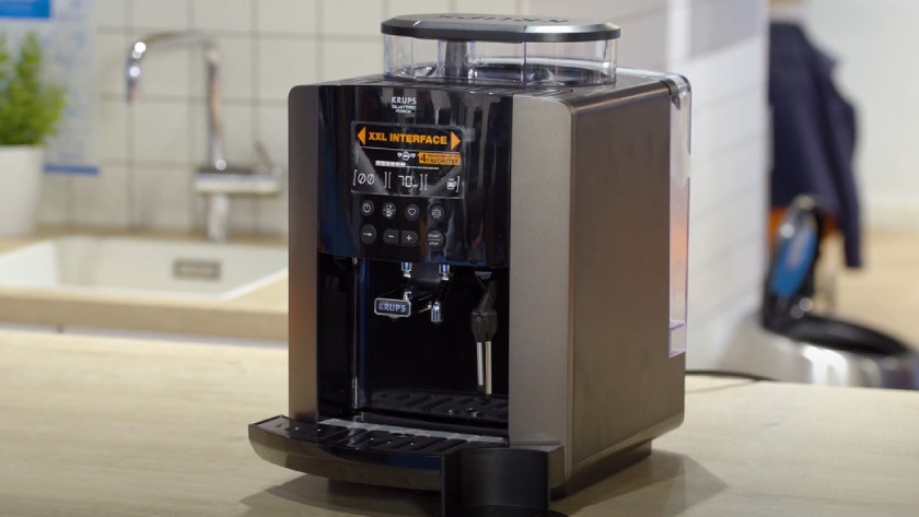 How do you clean the brew group of your Krups coffee machine? - Coolblue -  anything for a smile