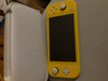 Nintendo Switch Lite Yellow + EA Sports FC 25 (Image 1 of 6)