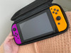 Nintendo Switch Joy-Con set Neon Paars/Neon Oranje (Afbeelding 1 van 4)