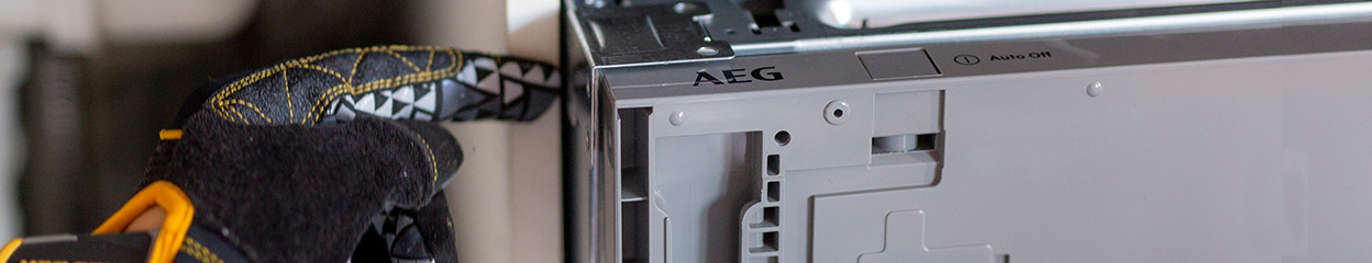 How do you replace the front panel of a dishwasher?