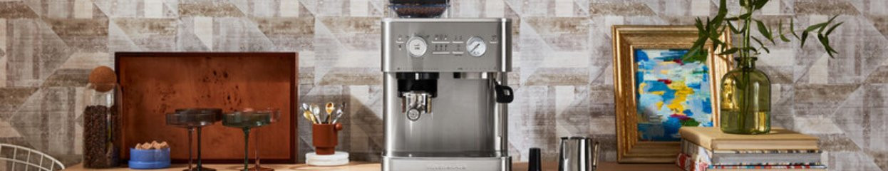 Wat is een KitchenAid pistonmachine?