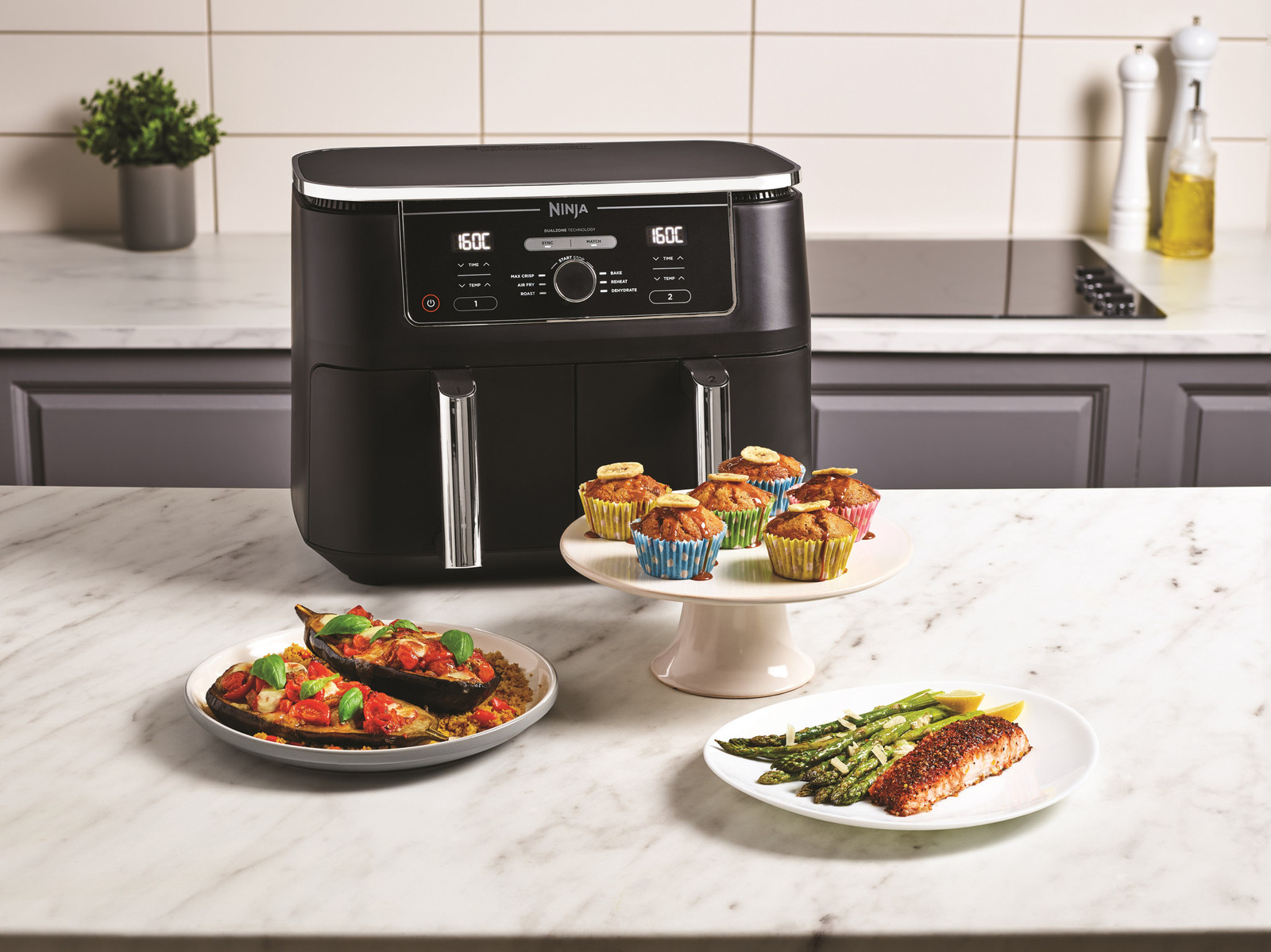Onze Ninja airfryer met 2 baklades