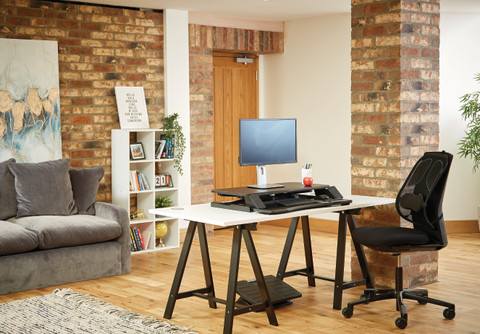 Fellowes Sit-Stand Workstation Black product in use