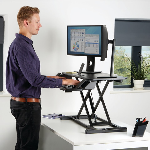 Fellowes Sit-Stand Workstation Black product in use