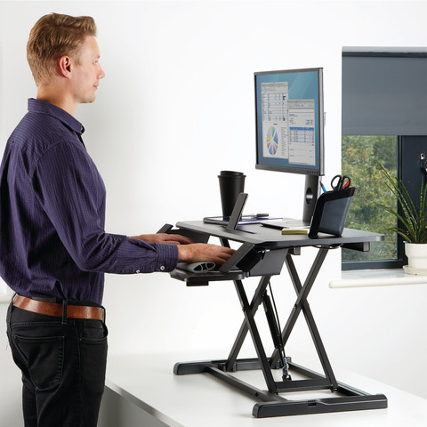 Fellowes Sit-Stand Workstation Black product in use