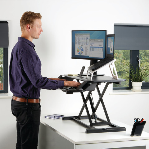 Fellowes Sit-Stand Workstation Black product in use