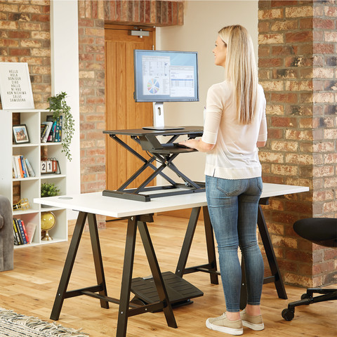 Fellowes Sit-Stand Workstation Black product in use