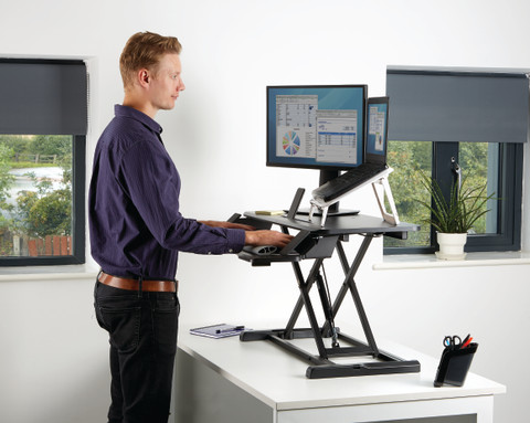 Fellowes Sit-Stand Workstation Black product in use