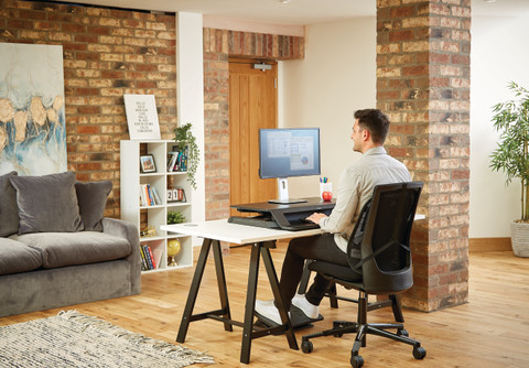 Fellowes Sit-Stand Workstation Black product in use