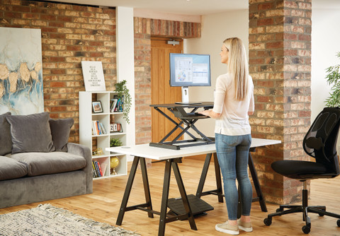 Fellowes Sit-Stand Workstation Black product in use