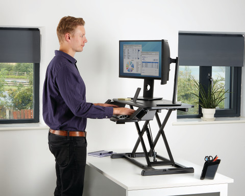 Fellowes Sit-Stand Workstation Black product in use