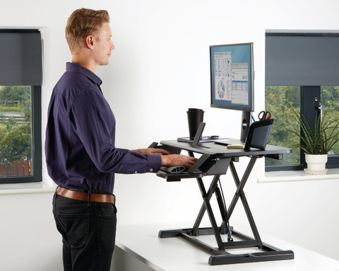 Fellowes Sit-Stand Workstation Black product in use