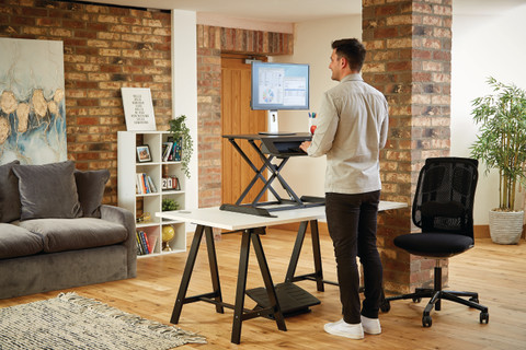 Fellowes Sit-Stand Workstation Black product in use