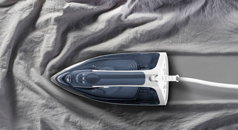 Tefal Express Steam FV2837 Steam Iron product in use