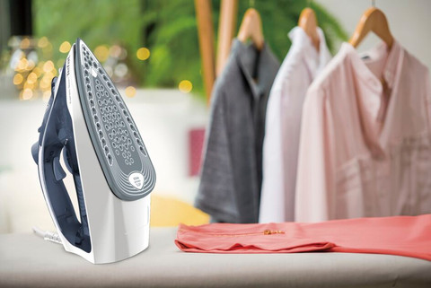 Tefal Express Steam FV2837 Steam Iron product in use